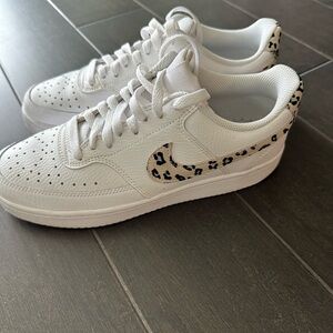 Nike White Sneakers with Black Pattern